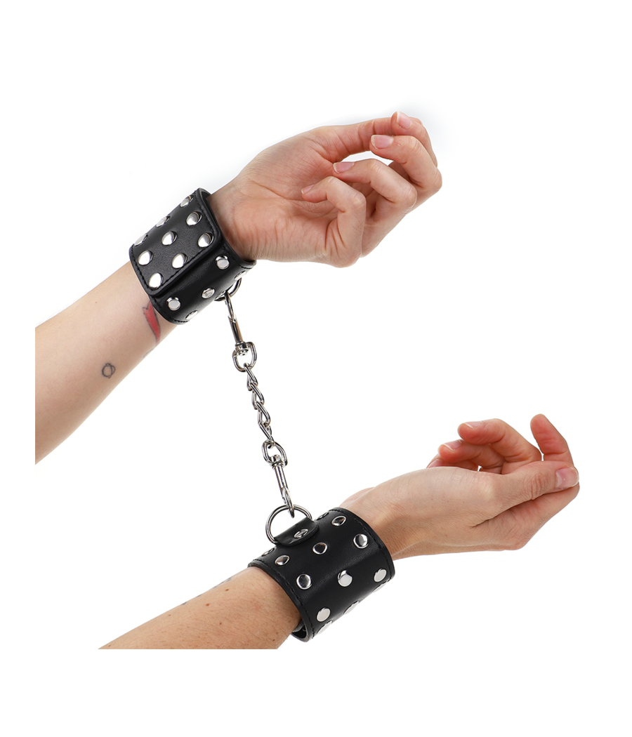 KINK - HANDGELENKFESSELN MIT DRUCKVERSCHLUSS VOLLER NIETEN SCHWARZ VERSTELLBAR 19-24 CM X 5,5 CM