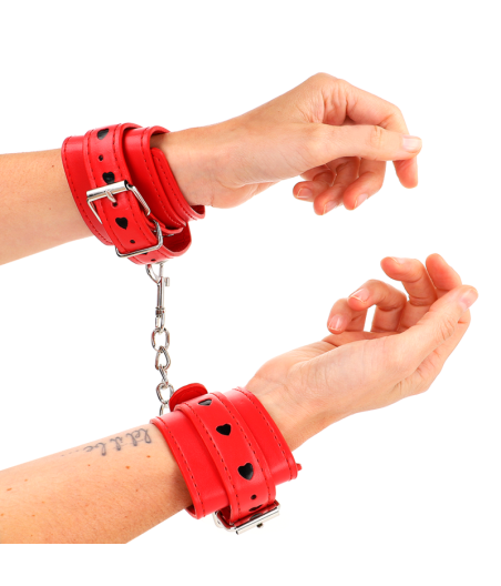 KINK - ROTE HANDGELENKSFESSELN MIT SCHWARZER HERZEINLAGE, VERSTELLBAR 21-28 CM X 5,5 CM